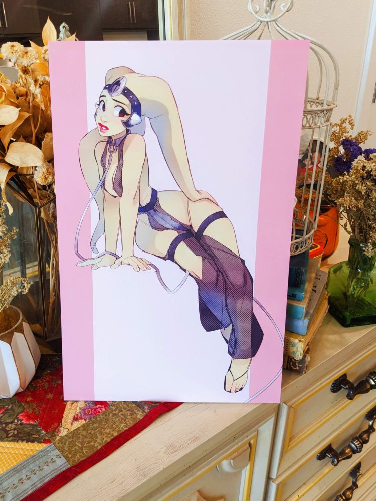 A photo of an 11x17 print featuring Oola the dancing Twi'Lek from Star Wars