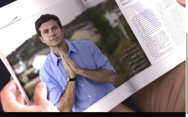 Jason Bateman as Michael Bluth doing prayer hands in an in-flight magazine profile. 