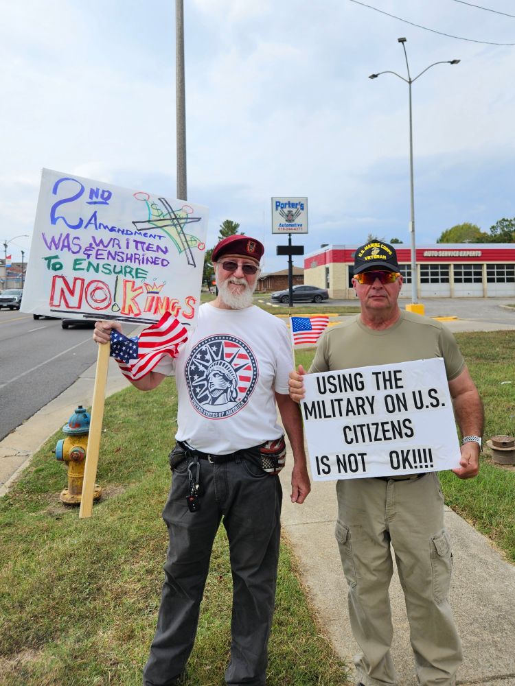 Two veterans protesting the ridiculous administration that is in power in America right now.