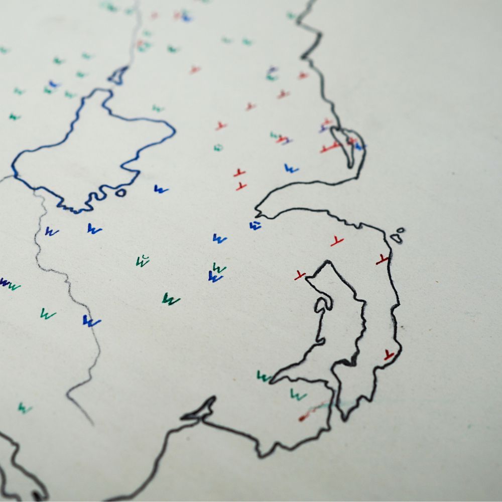 A view of a of Northern Ireland. Letters representing different ways of saying the number one dot the map.