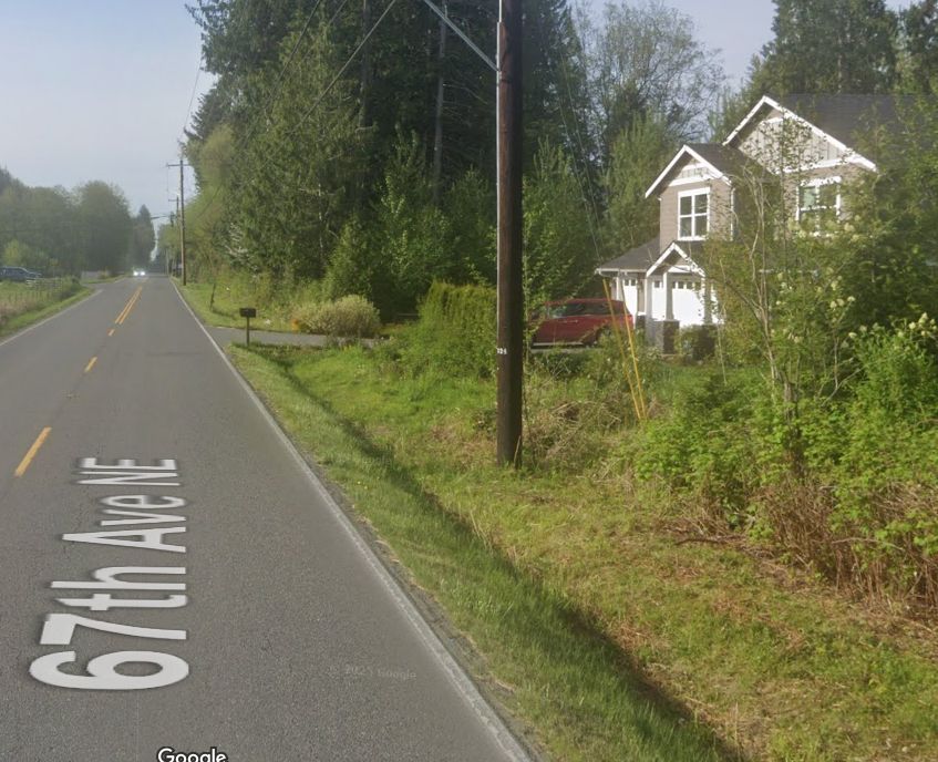 Screenshot of Google Maps street view, North Marysville WA, looking toward the video's accident site where the inattentive driver of the car finally came to a stop after drifting off the pavement