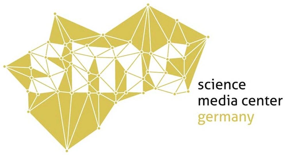 Logo of the Science Media Center Germany. The design features a golden polygonal network pattern made up of connected triangles and dots on the left, resembling a stylized abstract map or molecular structure. To the right, the text reads “science media center” in black lowercase letters and “germany” in gold lowercase letters.