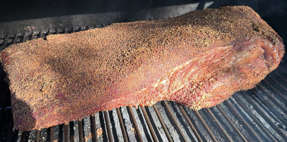A seasoned brisker on the smoker 
