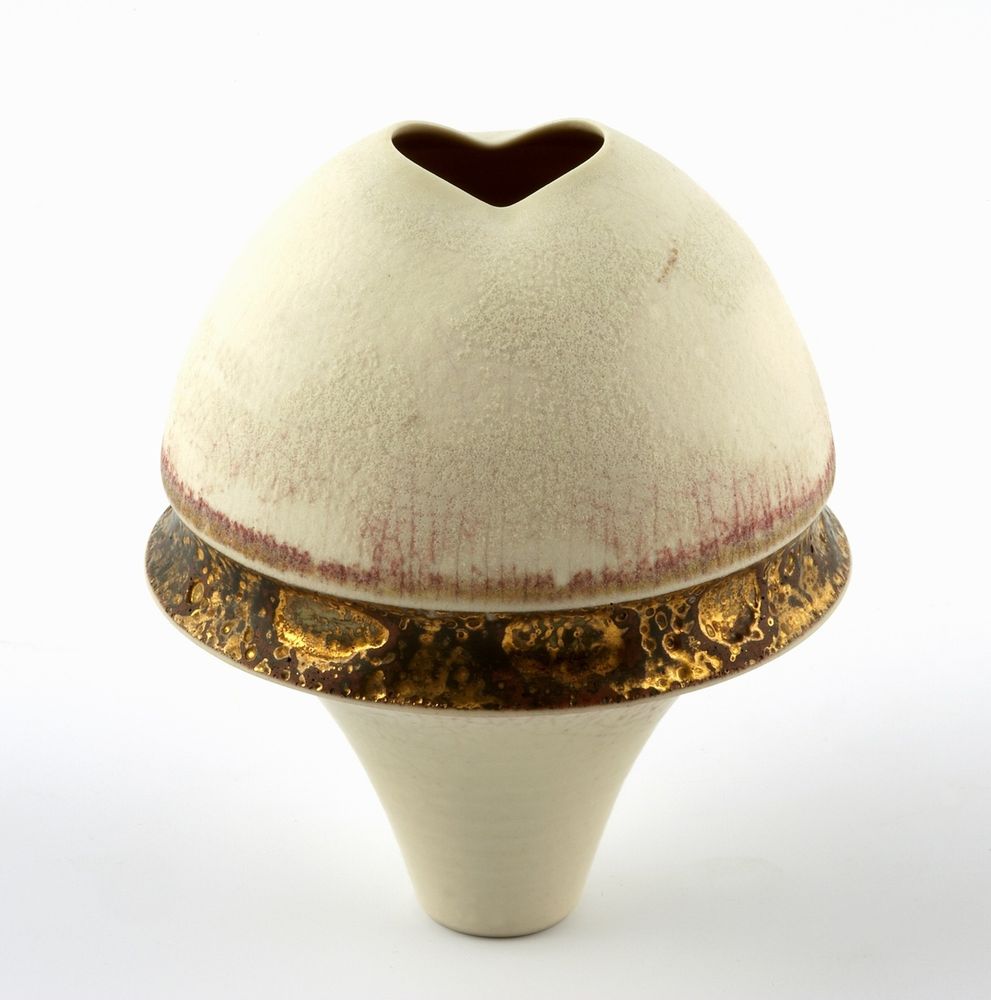 Ceramic artwork in a bud shape, with cream cracked glaze and a gold rim