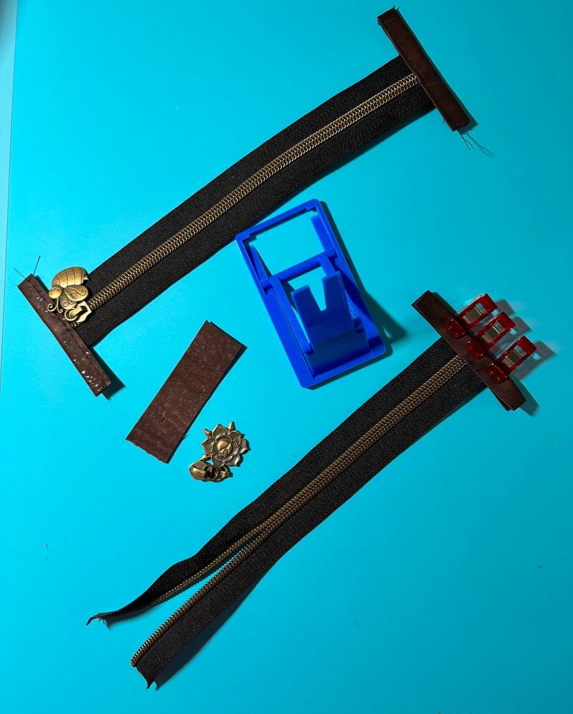 Zippers and Zipper pulls being assembled, almost forgot one! 