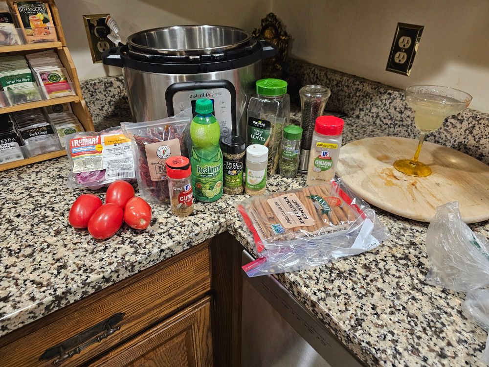 Instant pot, oxtail, tomatoes, arbol chilli's, lime, cumin, oregano,  garlic, bay leaves, cilantro, onion, pepper, cinnamon 