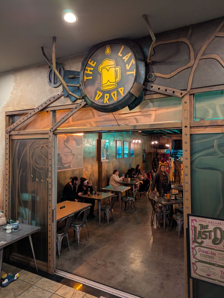 Store front with sign that says "The Last Drop"