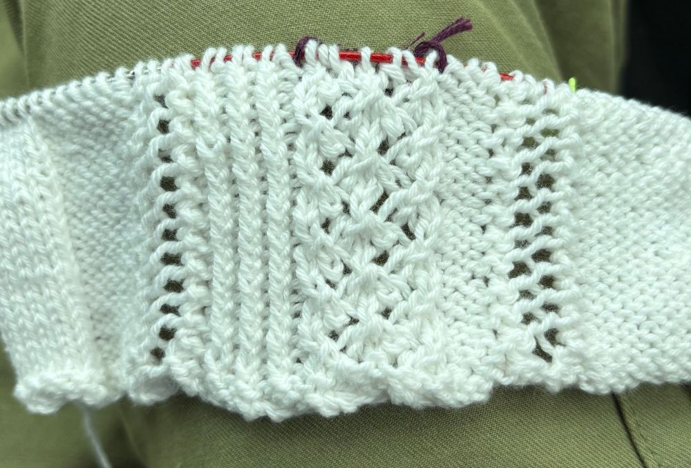 White lace knitting of a soon to be chemise
