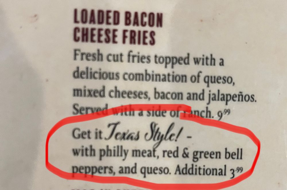 Menu for loaded cheese fries lists “Texas Style” option containing Philly meat, bell peppers and queso. 