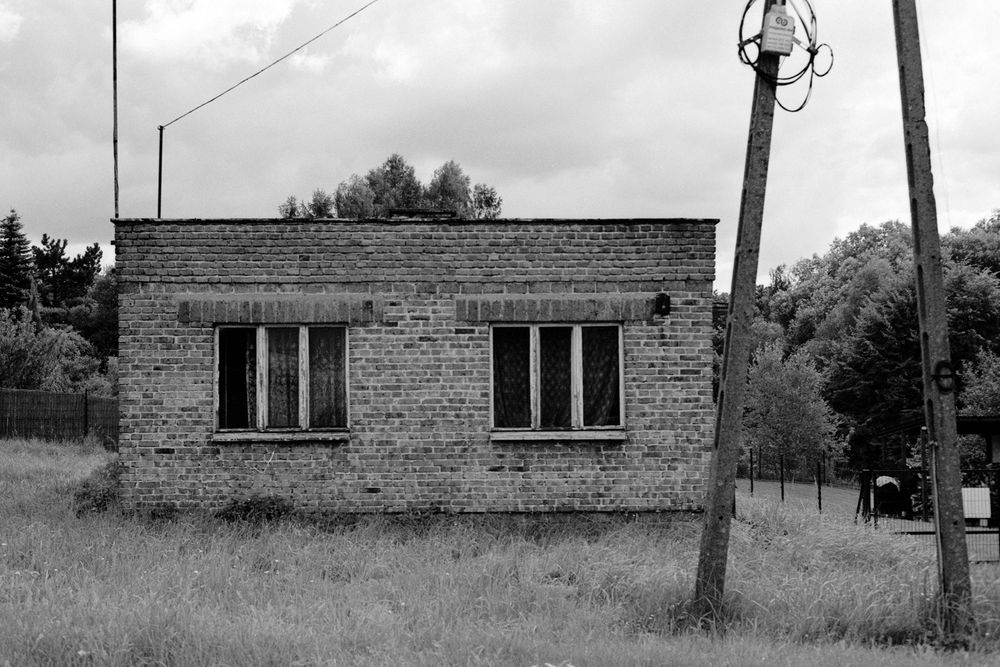 a strange, small rectangular brick house