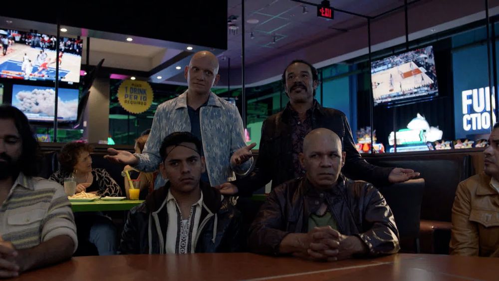 A scene from HBO's "Barry" in which Hank and Christobal have a sit down meeting between criminal gangs at a Dave & Busters