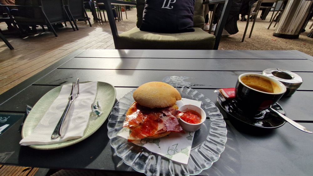 Coffee, toasted bap, Iberico ham and tomato 