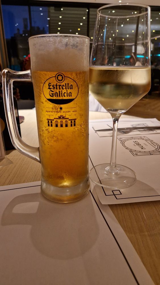 Estrella beer and a glass of wine