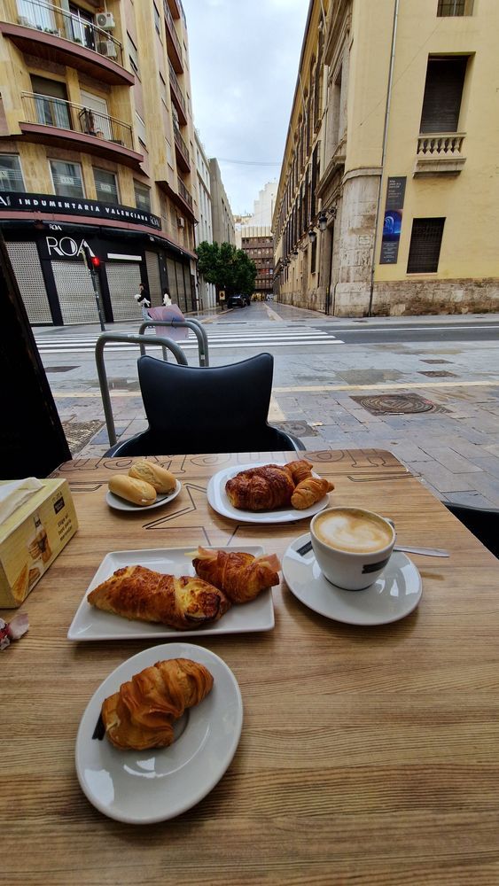 Coffee, croissants with pistachio or cheese, cheese and ham roll, bocadillo