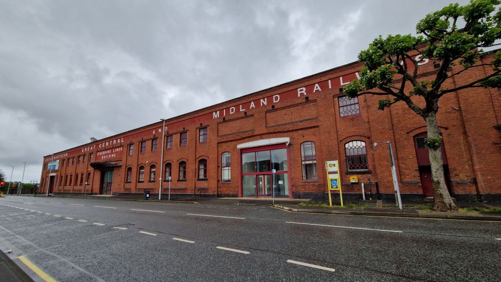 Large low redbrick terminus building 