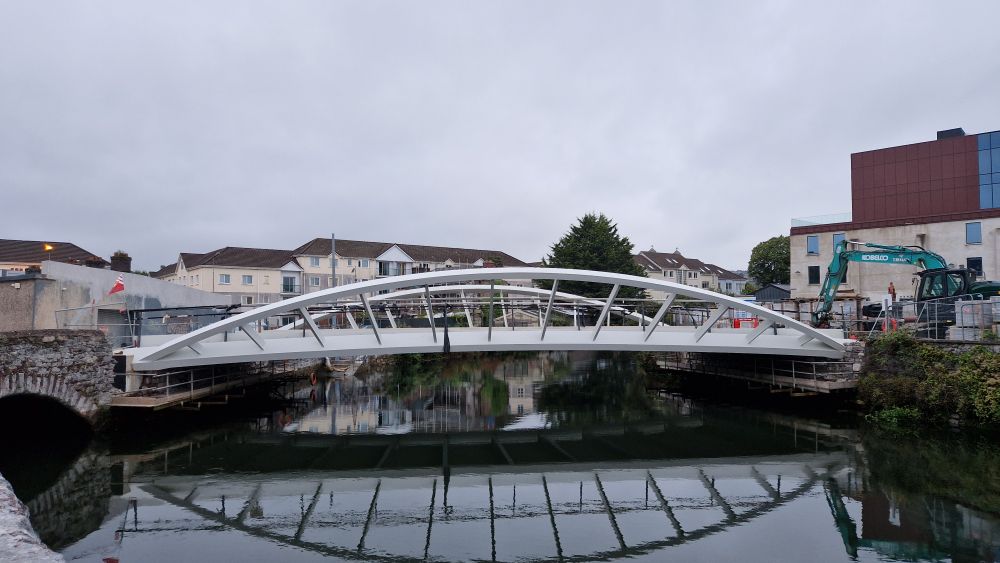 White bridge , upper curved between quay and the non existent event centre.