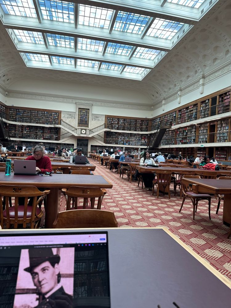 Photo of the Mitchell Reading Room, book lined and majestic space. 