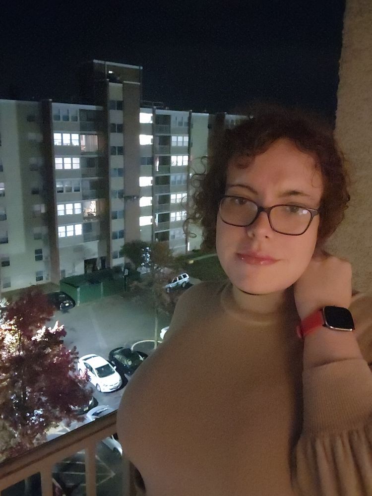 Symphony posing out a balcony 