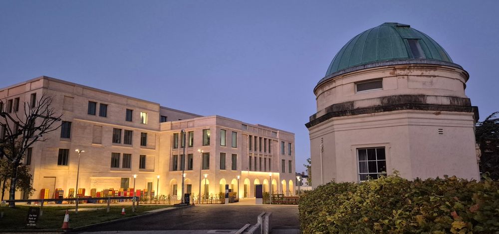 Schwarzman Centre of the Humanities at dawn with Radcliffe Observatory site in foreground.