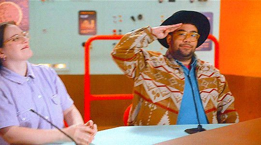 Oscar Montoya, comedian, doing a "salute" gesture in YouTube show "Gastronauts"