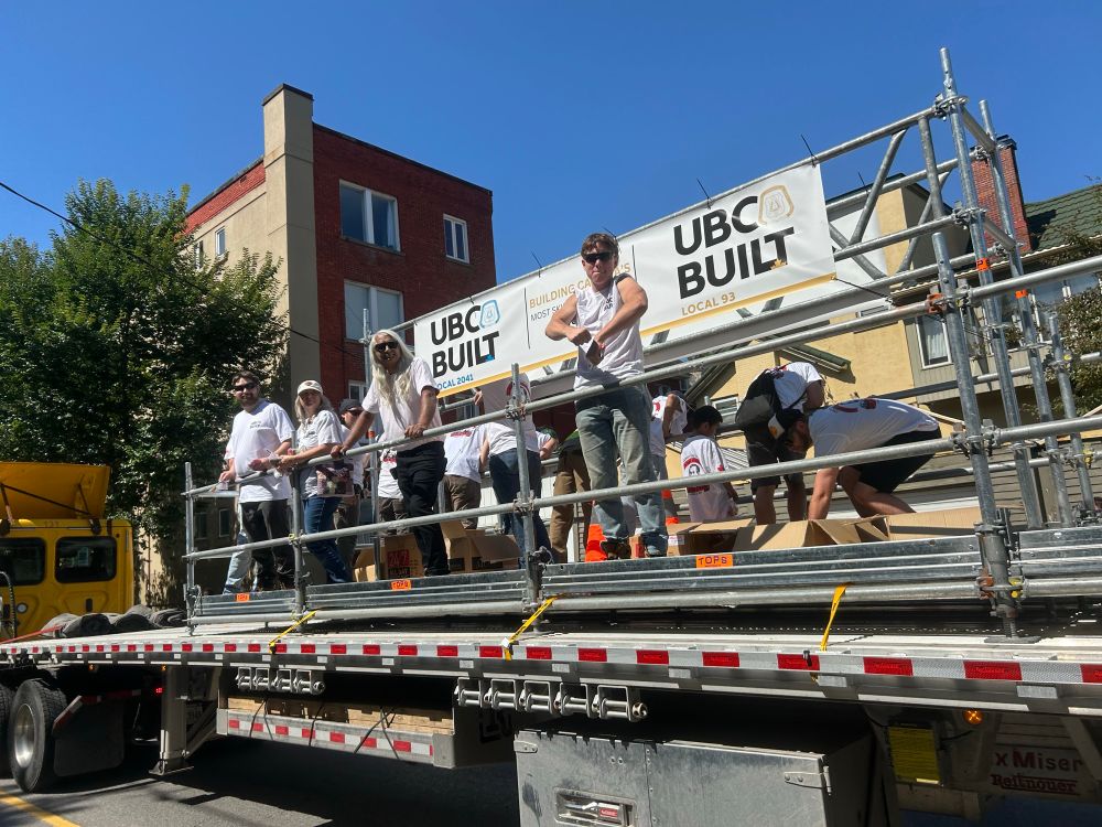 Members of the carpenters union on a float.