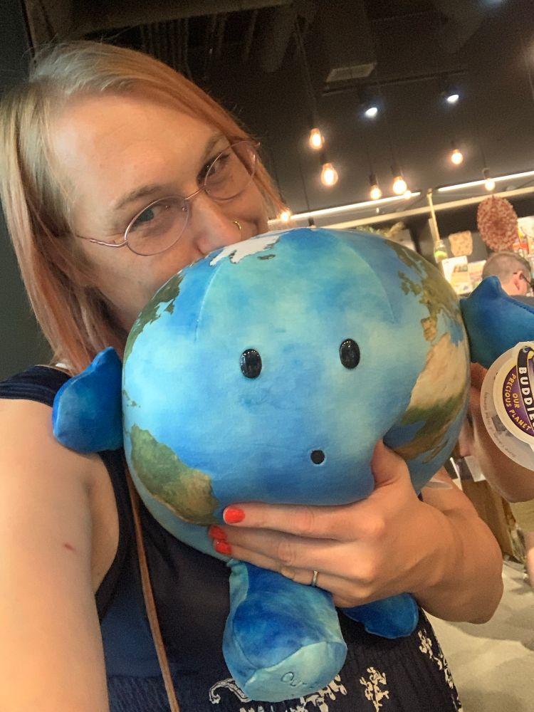Me hugging a big plushie Earth