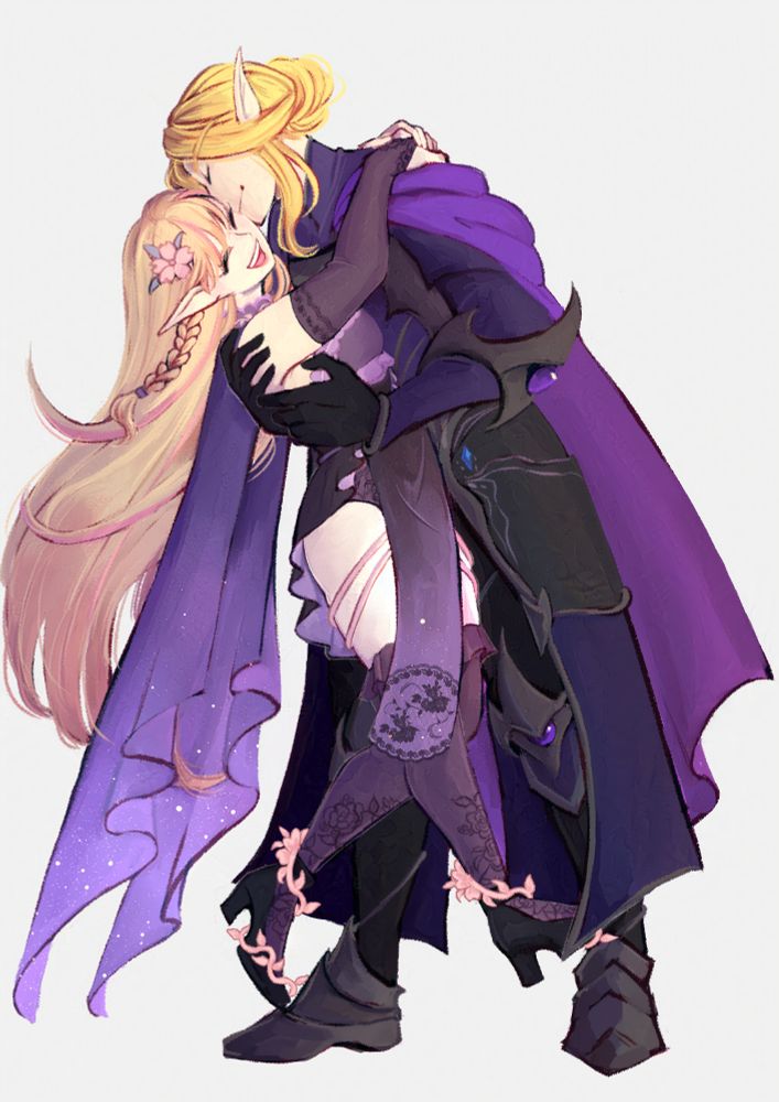 a couple in a loving embrace, the man on the right lifting the woman slightly off the ground.