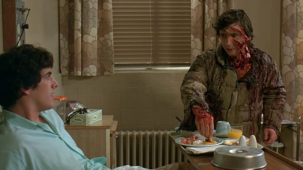 A famished and newly deceased... undead... rotting corpse Jack (Griffin Dunne) visits his friend David (David Naughton) in the hospital and helps himself to some breakfast, then warns his buddy that they are both cursed.