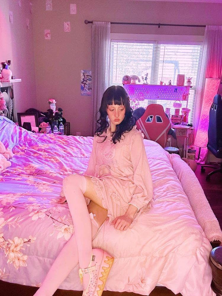 bunny in casual sweet lolita on her bed 