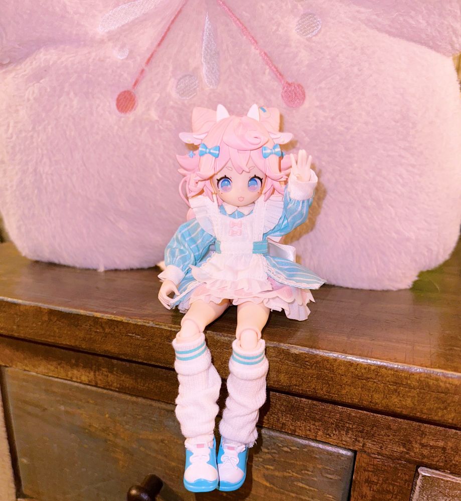 a trans color palette ram girl that is dressed sugary sweet 