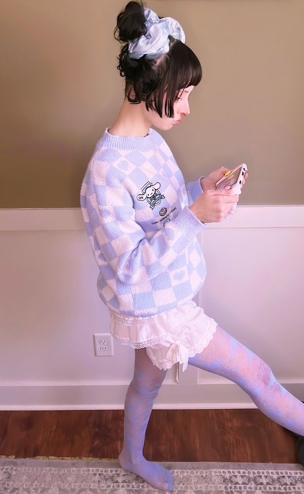bunny playing the switch in a cinnamoroll outfit walking away 