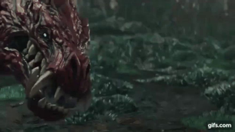 a video game character is fighting a monster in a cave with the name odogaron on the bottom of the screen .