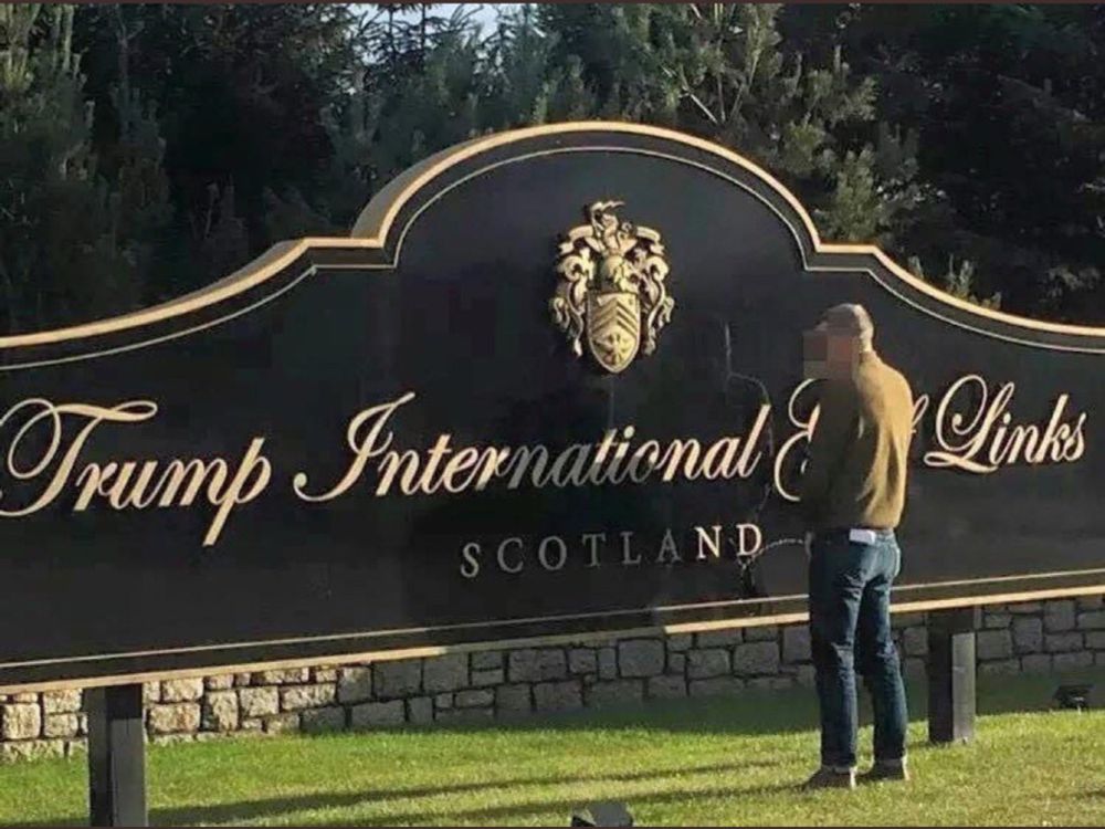 Scottish man pissing on Trump golf course sign in Scotland. Hero. 