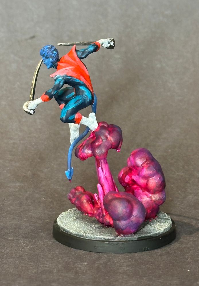 Nightcrawler model from Marvel crisis protocol. Blue skinned man with two swords jumping out of magenta smoke