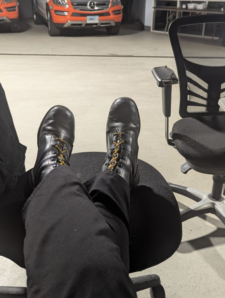 Waiting around for calls in my shiny boots :3