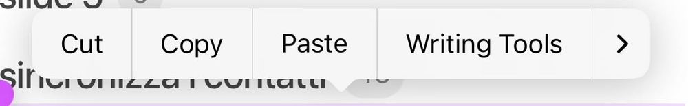 iOS copy/paste popup showing options to cut, copy, paste, and "writing tools" for Apple intelligence