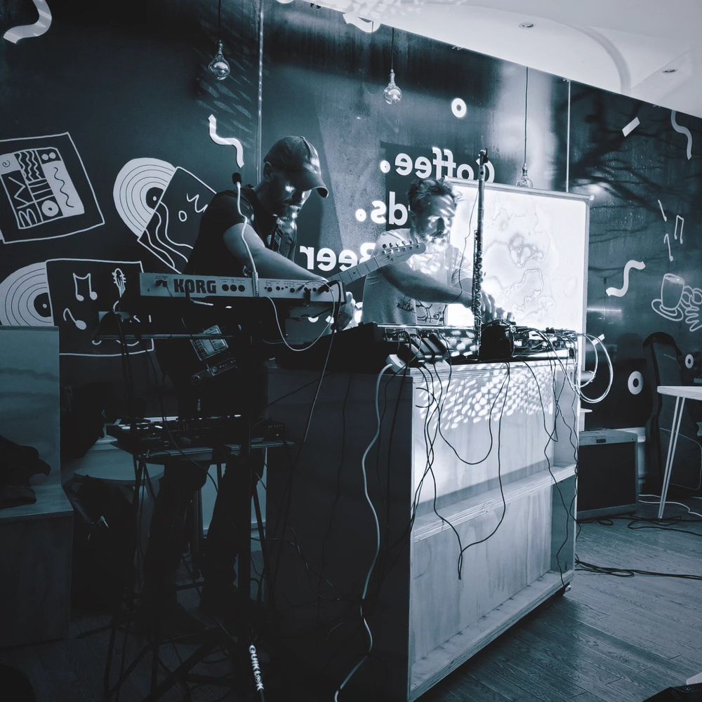 Two men DJing