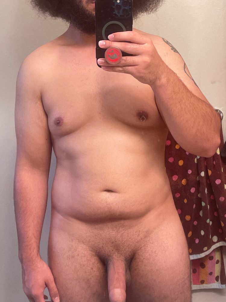 mirror selfie of me naked, view is from shoulders down to tip of cock/ mid thigh. i have my right nipple pierced and am uncut, i have low trimmed pubes