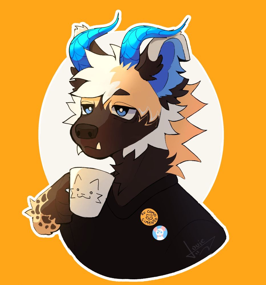 Moka, an african wild dog and goat mix. He's yellow, brown, white and blue.