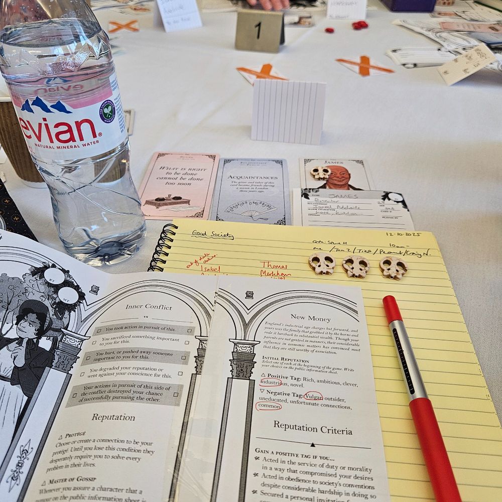 A game table for Good Society, with character sheets, tokens, and reference sheets