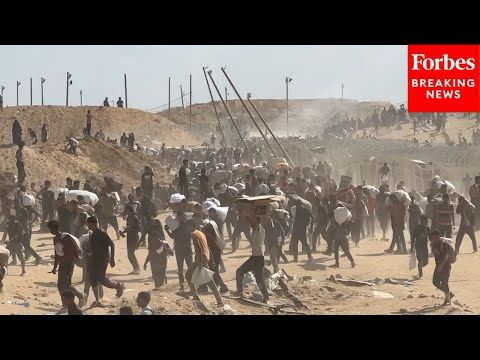 Palestinians March Through Gaza In Search Of Food Aid
