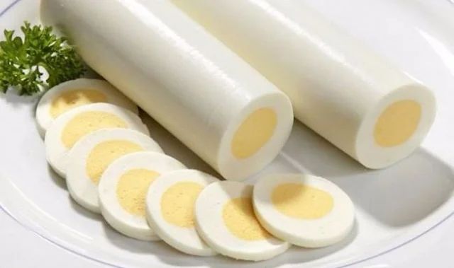 Two long egg logs, with sliced cross sections