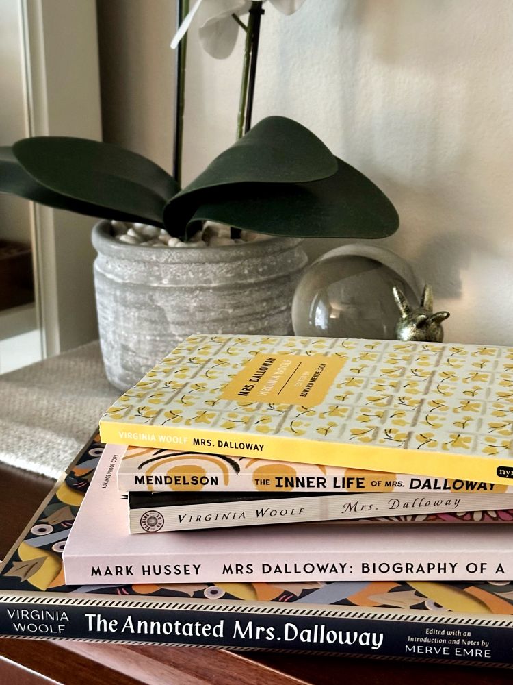 A book stack featuring The Annotated Mrs. Dalloway, Mark Hussey’s Mrs. Dalloway: Biography of a Novel, my well-loved old edition, and—coming soon from Columbia University Press—Edward Mendelson’s The Inner Life of Mrs. Dalloway. On top is the new NYRB Classics edition. 