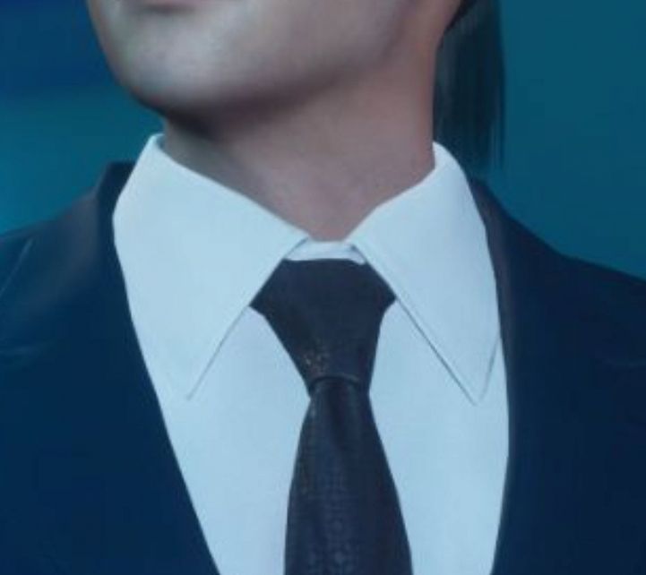 Tseng's tie in Crisis Core Reunion. While black-on-black, it has a complex patterned texture with circular elements and contrasting sheen threads.