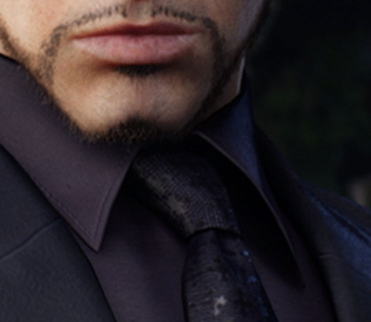 Rude's tie knot in FFVII Remake. It is a simple tie knot in a thick, satin-esque tie bearing a pointed trefoil cross pattern.