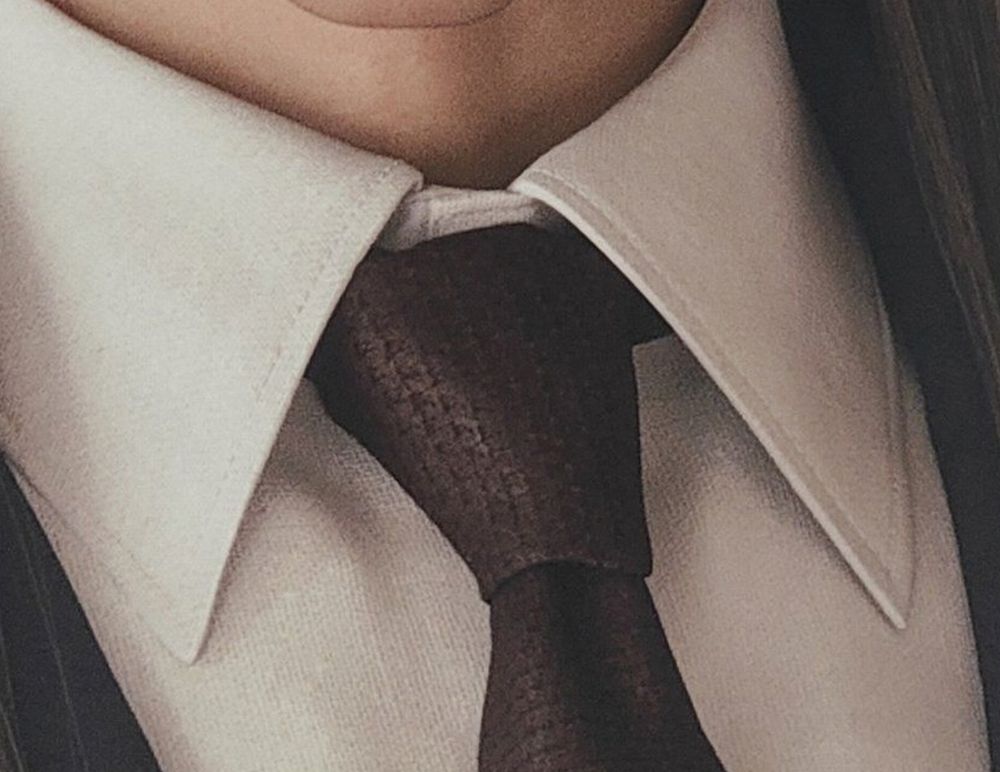 Tseng's tie in FFVII Remake. It has a smaller, simpler repeating pattern that amounts to little more than a texture.