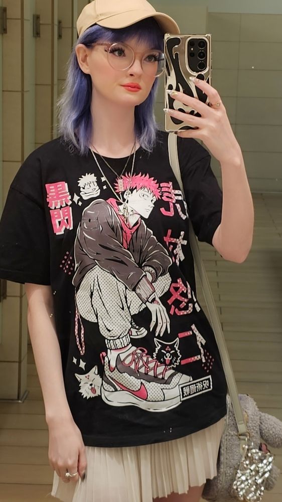 Blue hair, 5'8 girl wearing Itadori from JJK on her shirt. He is wearing pink nikes. Her skirt is white and taking selfie in a mirror.
