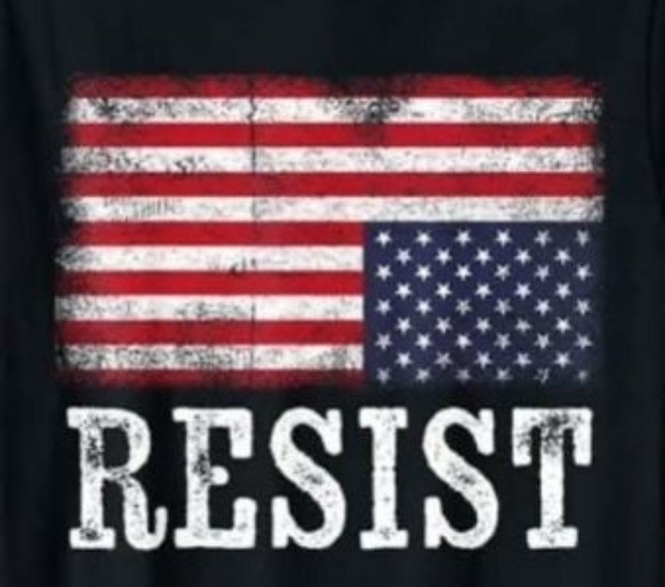 Upside down American flag with the words resist below it. 