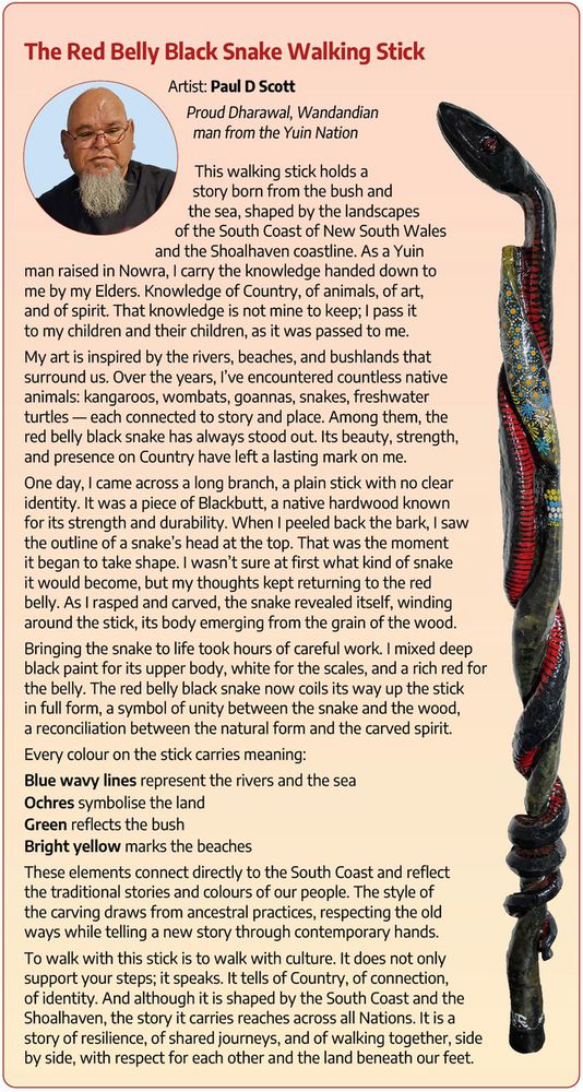 Image and story about The Red Belly Black Snake Walking Stick, a powerful carving by Uncle Paul Scott