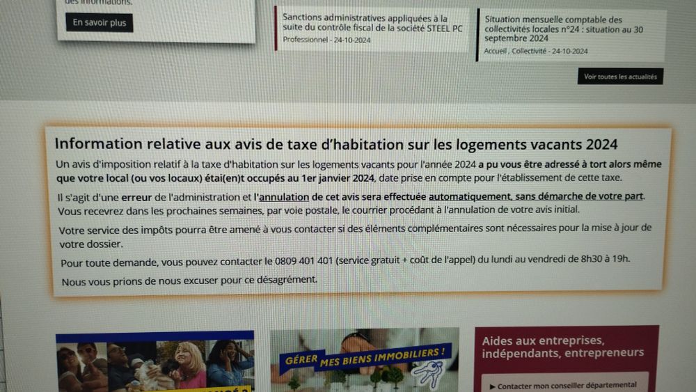 Photo d'un pc, sur l'écran le site des impôts, une information indique qu'il y a eu une erreur dans les taxes d'habitation des logements vacants...